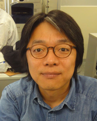 張 明